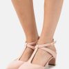 talons classiques clarks rose clair unisexe N6R8B6976 Clarks rose clair